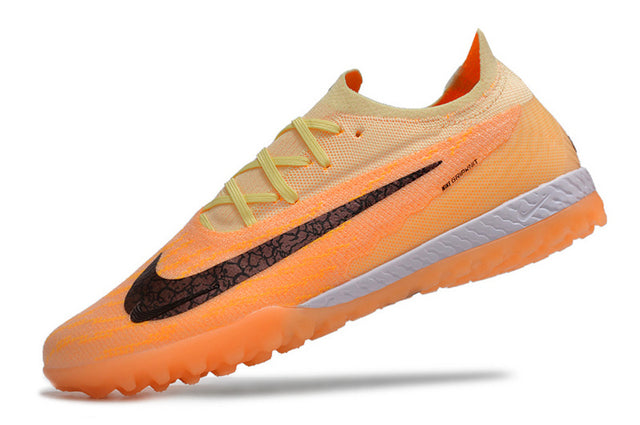 Chuteira Nike Phantom GX Elite Society TF "Blaze"