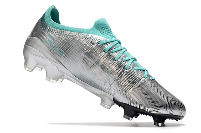 Chuteira Puma Ultra 1.3 Campo FG - Prata/Preto /Azul