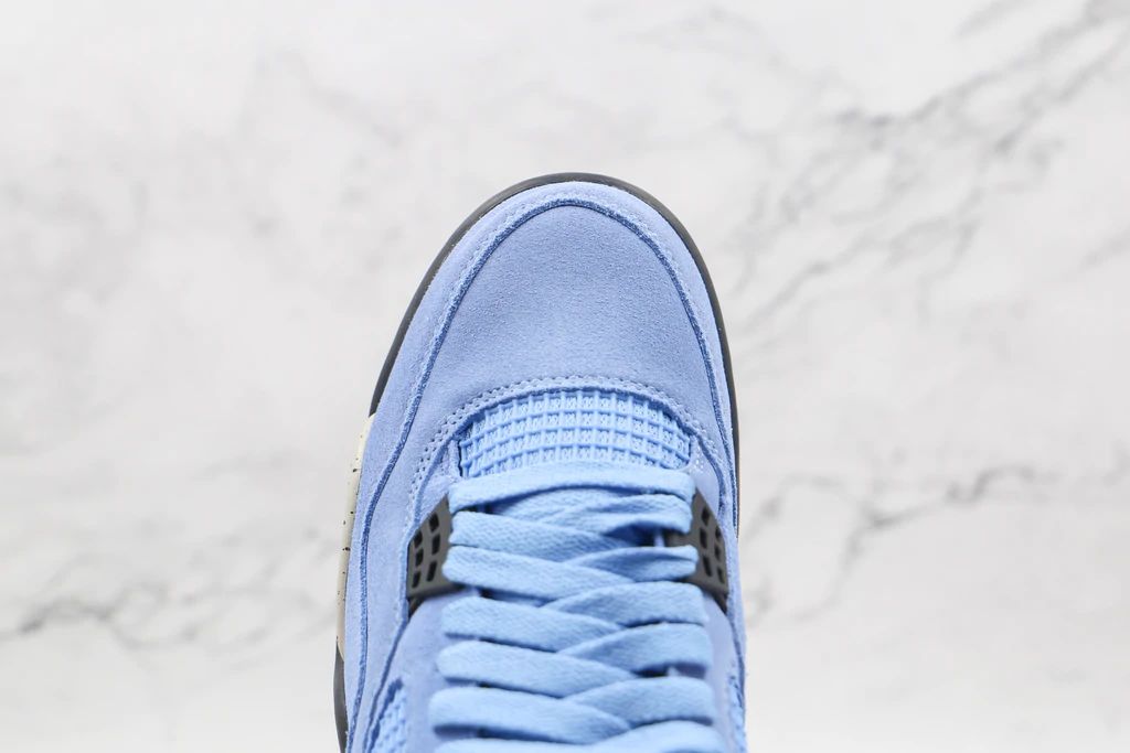 Tênis Nike Air Jordan 4 Retro University Blue