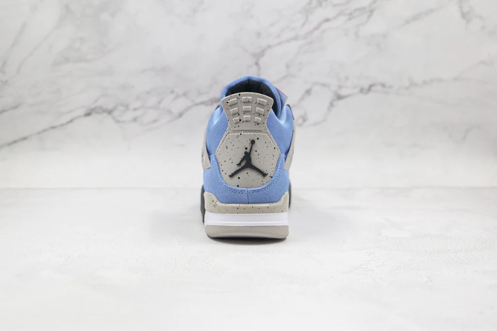 Tênis Nike Air Jordan 4 Retro University Blue