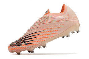 Chuteira New Balance Forum FG - Rosa