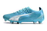 Chuteira Puma Ultra Ultimate Campo FG - Azul/Rosa